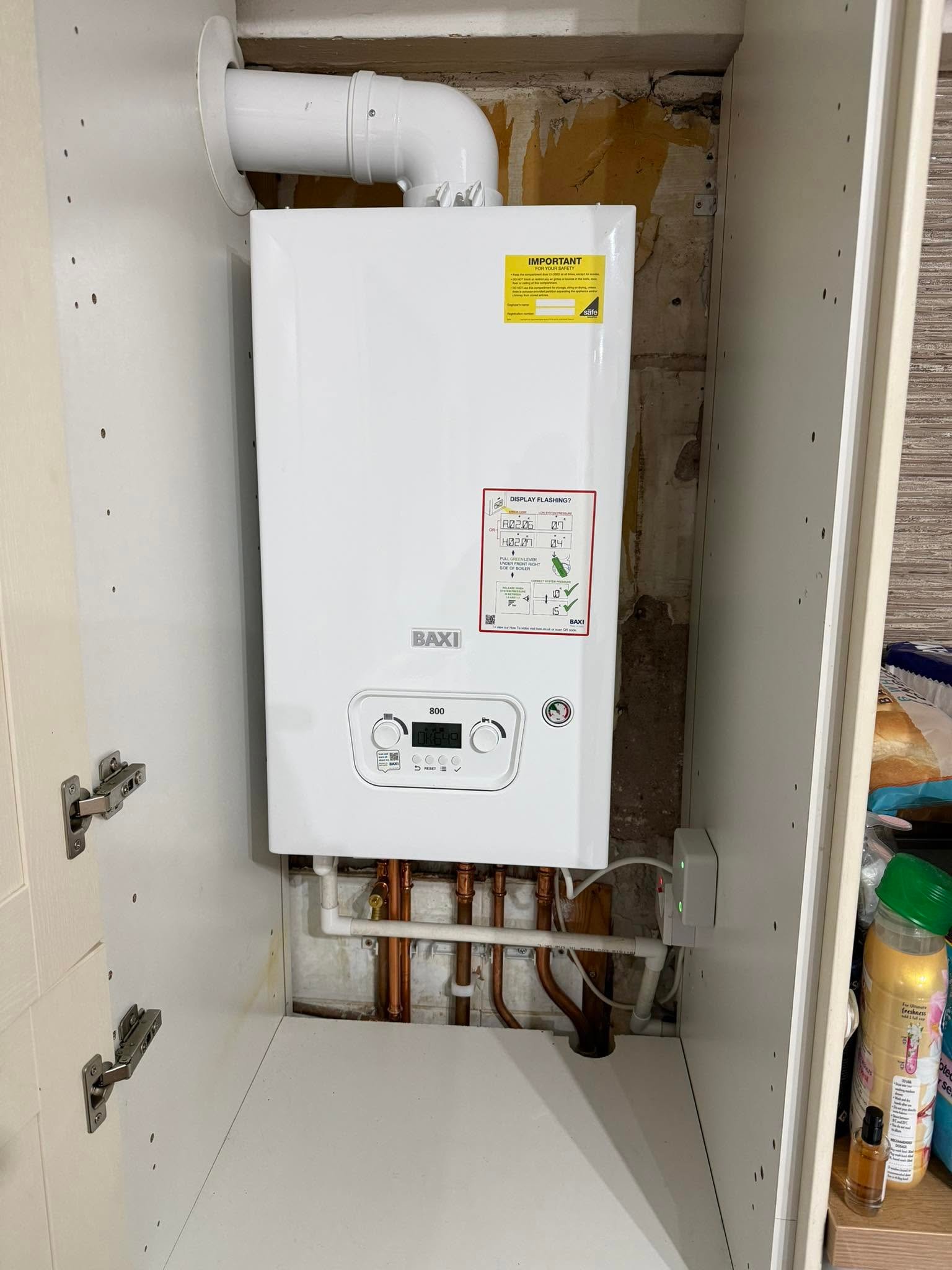 Boiler installation integrated into cabinetry