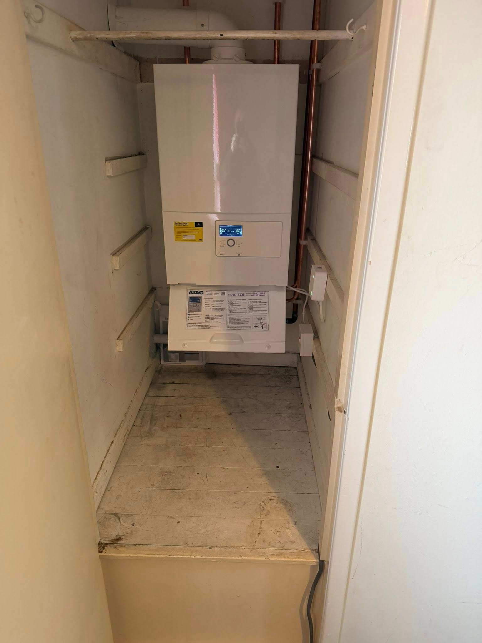 Boiler installed inside a cupboard in Fife