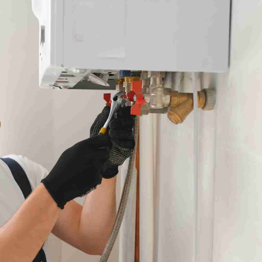 Engineer completing a boiler repair in Fife