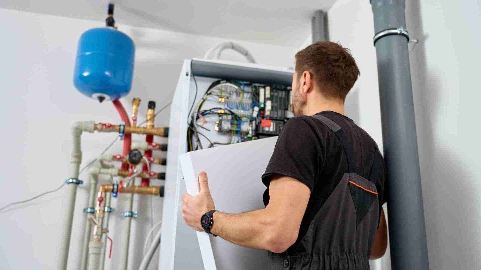 Engineer diagnosing a boiler repair in Fife
