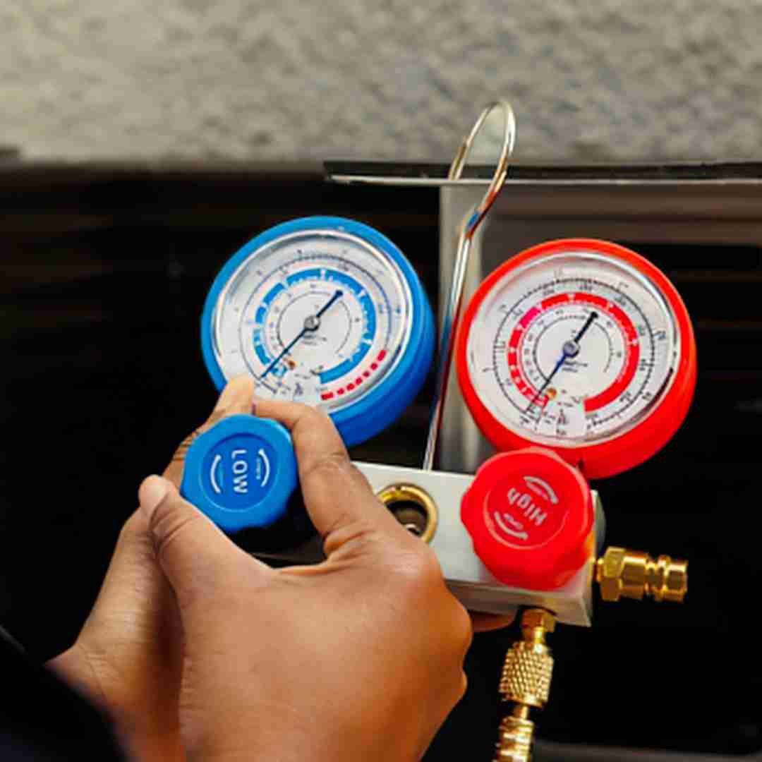 Pressure gauges used during an LPG appliance service in Fife
